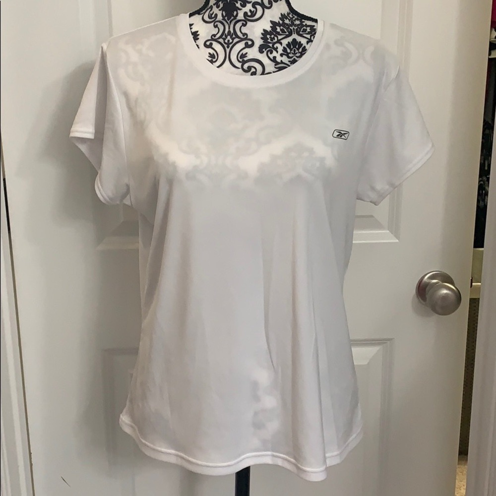 Ladies Reebok short sleeve workout shirt.